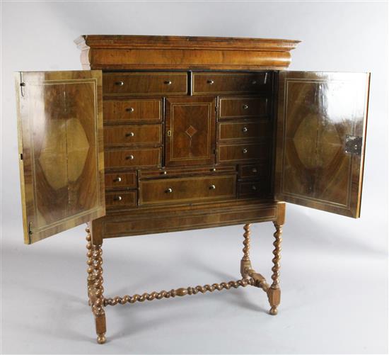 A William and Mary walnut cabinet on stand, W.3ft 6in. D.1ft 7in. H.4ft 11in.